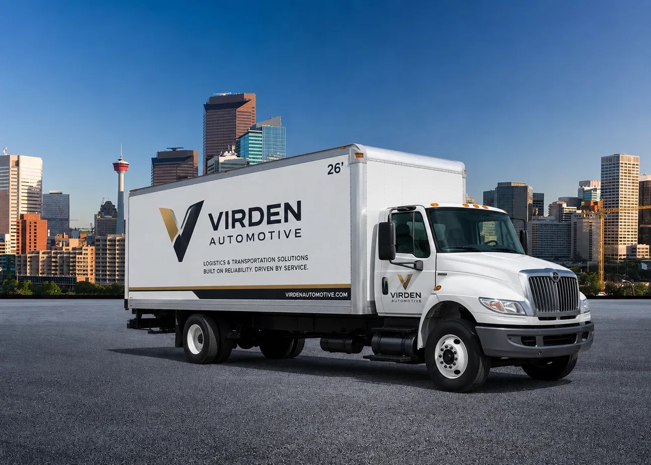 Branded Virden Automotive 26-foot straight truck against the Vancouver skyline